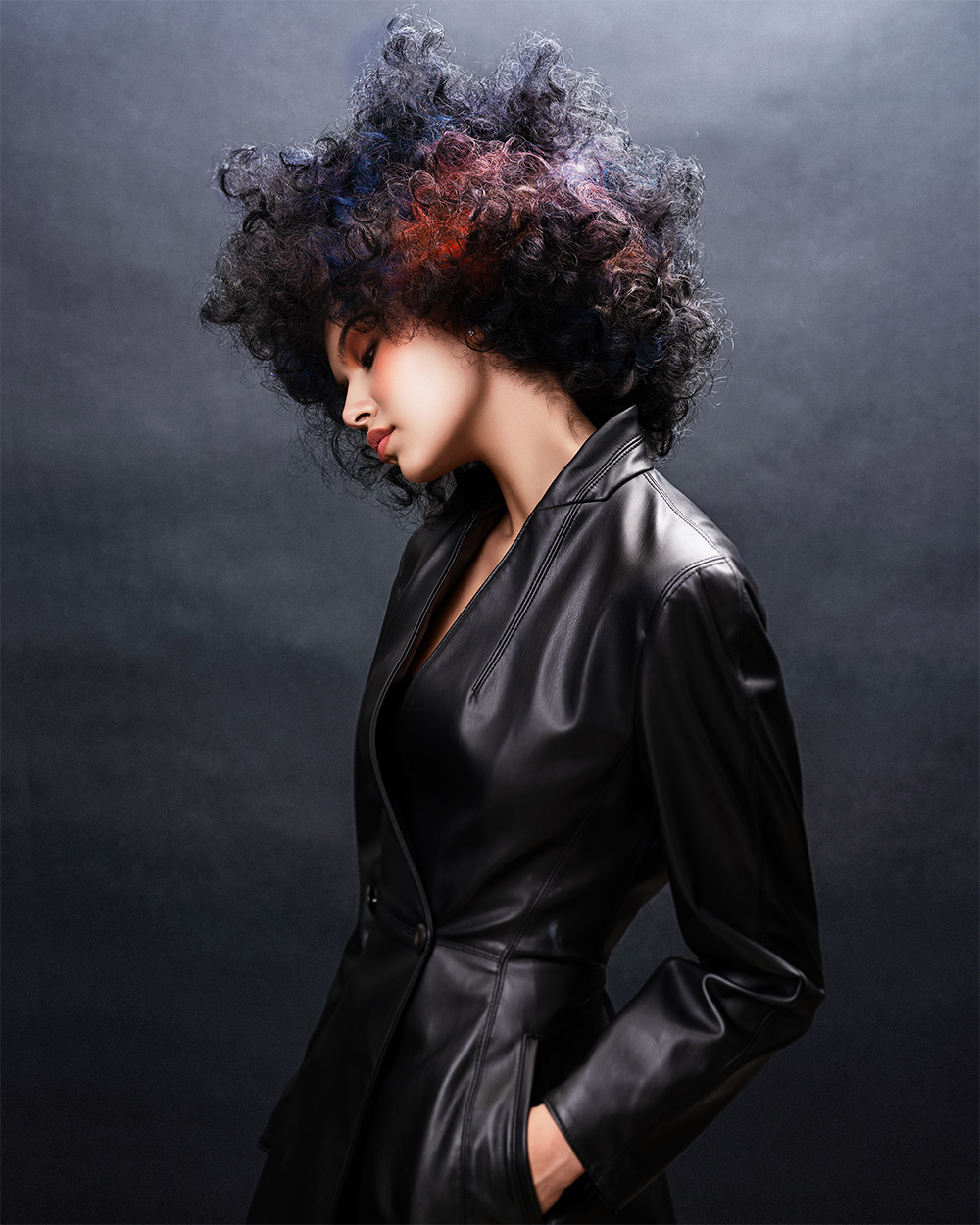 Voluminous Black Curly Hairstyle with Red Highlights – James Abu-Ulba – What You Seek Collection
